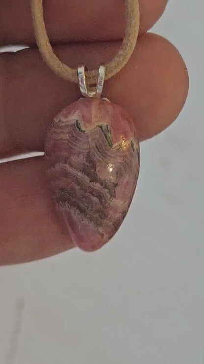 Small fine Rhodochrosite on 925 silver eyelet pendant, 26 x 14 x 7 mm, drilled, on adjustable leather strap